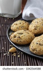 cereal cookies with milk on a wooden background