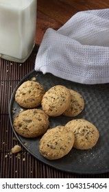 cereal cookies with milk on a wooden background