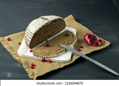 black rye bread with pomegranate seeds