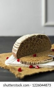 black rye bread with pomegranate seeds