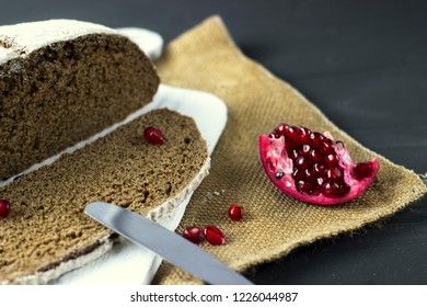black rye bread with pomegranate seeds