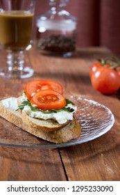 Sandwich toast bread for breakfast with cheese and orange juice, tomatoes, lettuce