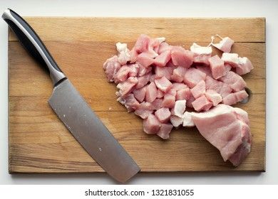Slices of pork on a cutting board