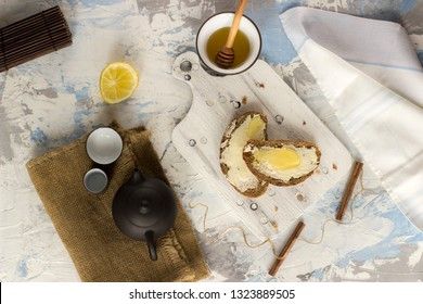 Pieces of bread with butter and honey, view from above