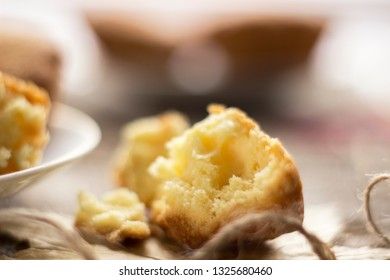 Sweet cupcakes on old wooden background. Macro.