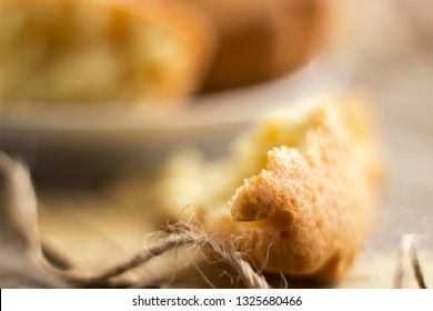 Sweet cupcakes on old wooden background. Macro.