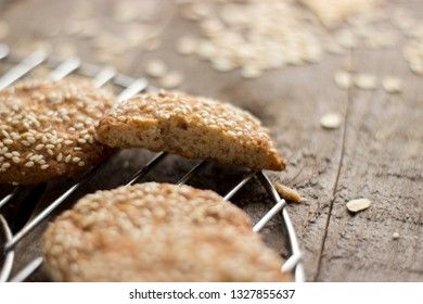 Oatmeal cookies on tray on rustic wooden table