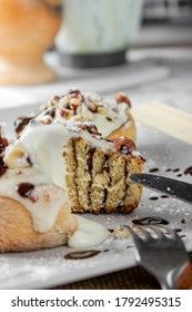 original cinnabon rolls with chocolate-cream sauce and hazelnuts
