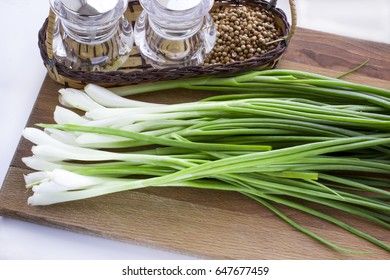 Green onion on a cutting board